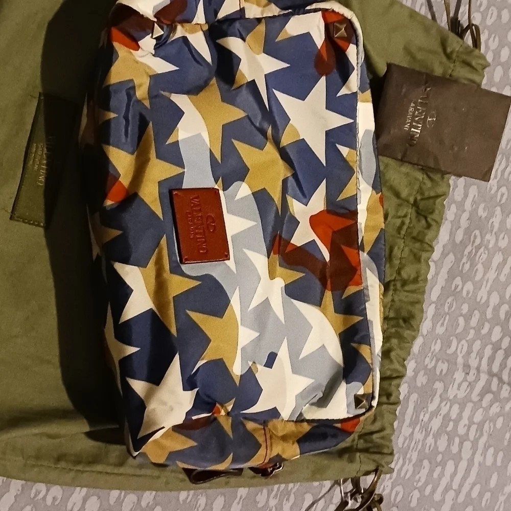 Valentino Garavani pouch.